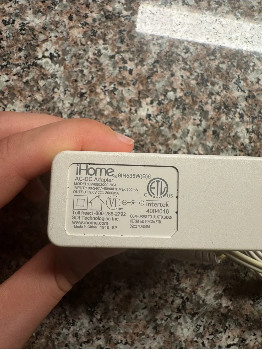 iHome AC-DC Adapter 9H535W(B)6. Let me know if you have any questions.